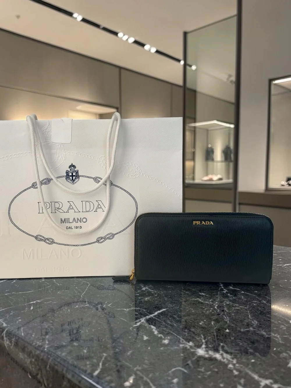 Prada Black Saffiano Zip-Around Clutch with Gold Logo